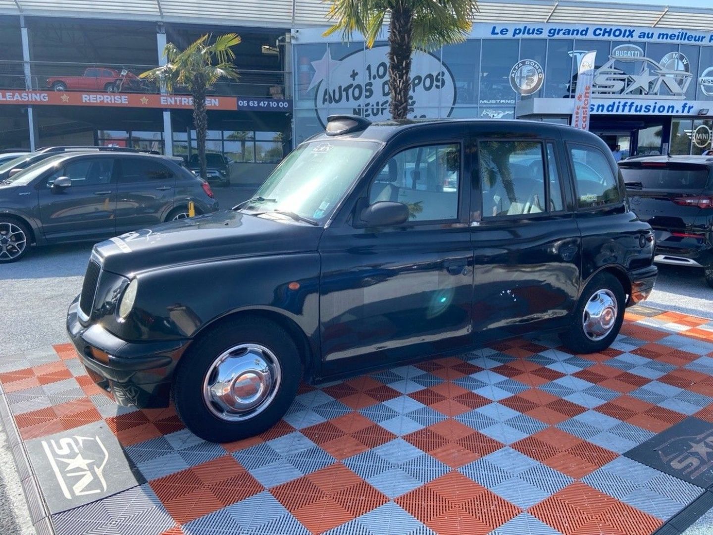 LTI CARBODIES TAXI FX 414